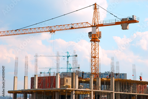 Construction cranes in city
