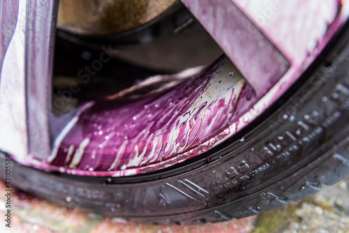 Tableau sur toile Close up of modern wheel after apply iron remover (break dust cleaner)