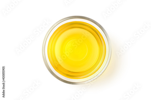 Flat lay of Vegetable Cooking Oil in glass bowl isolated on white background. Clipping path photo
