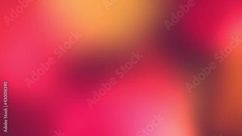 Abstract gradient background of softly flowing red and yellow lights, color spots.