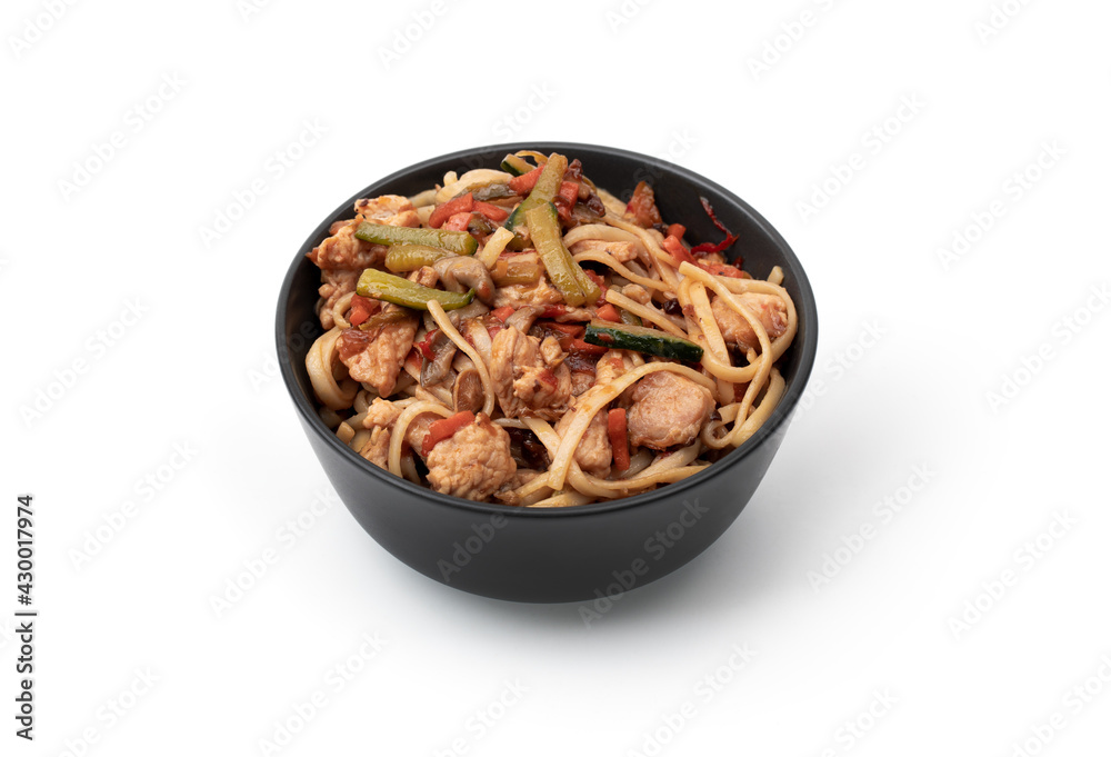 Asian wok noodles on white background. Wok noodles close-up. Asian wok noodles on white background. Wok noodles close-up.