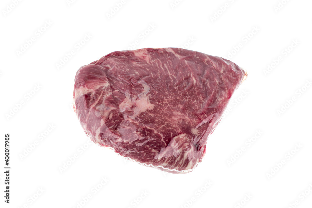 Vacuum packed meat on a white background. Close-up of beef in a vacuum bag. Vacuum packed meat on a white background. Close-up of beef in a vacuum bag.