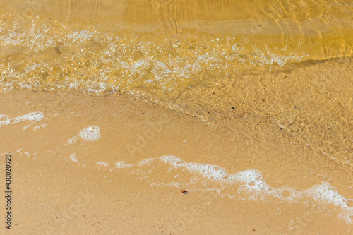 Soft wave of sea on sandy beach