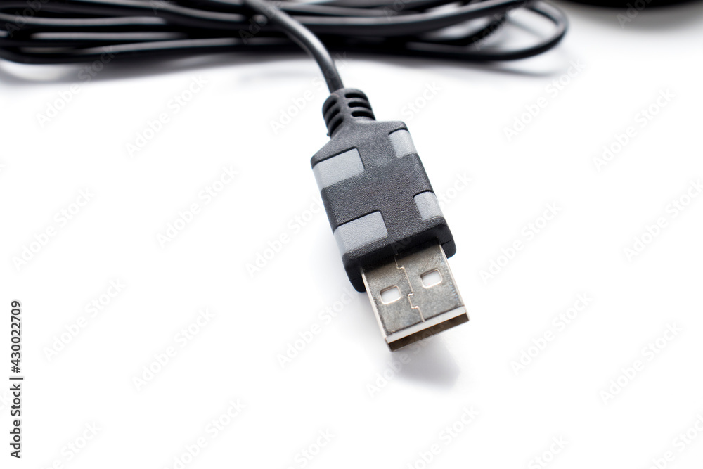 USB cable on a white background close-up. USB cable on a white background close-up.