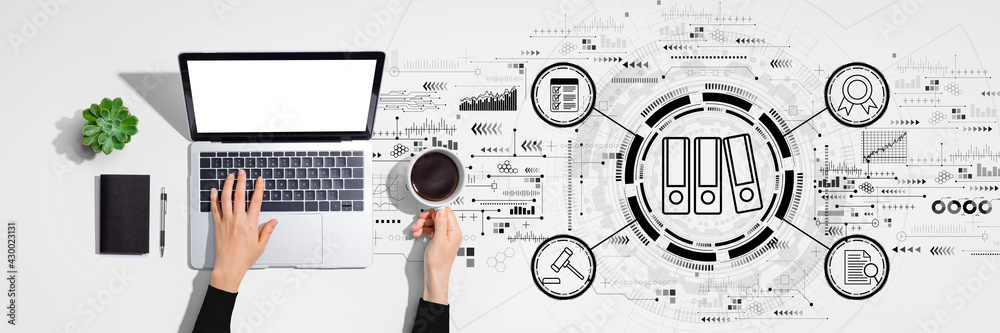 Compliance theme with person using laptop computer Compliance theme with person using laptop computer
