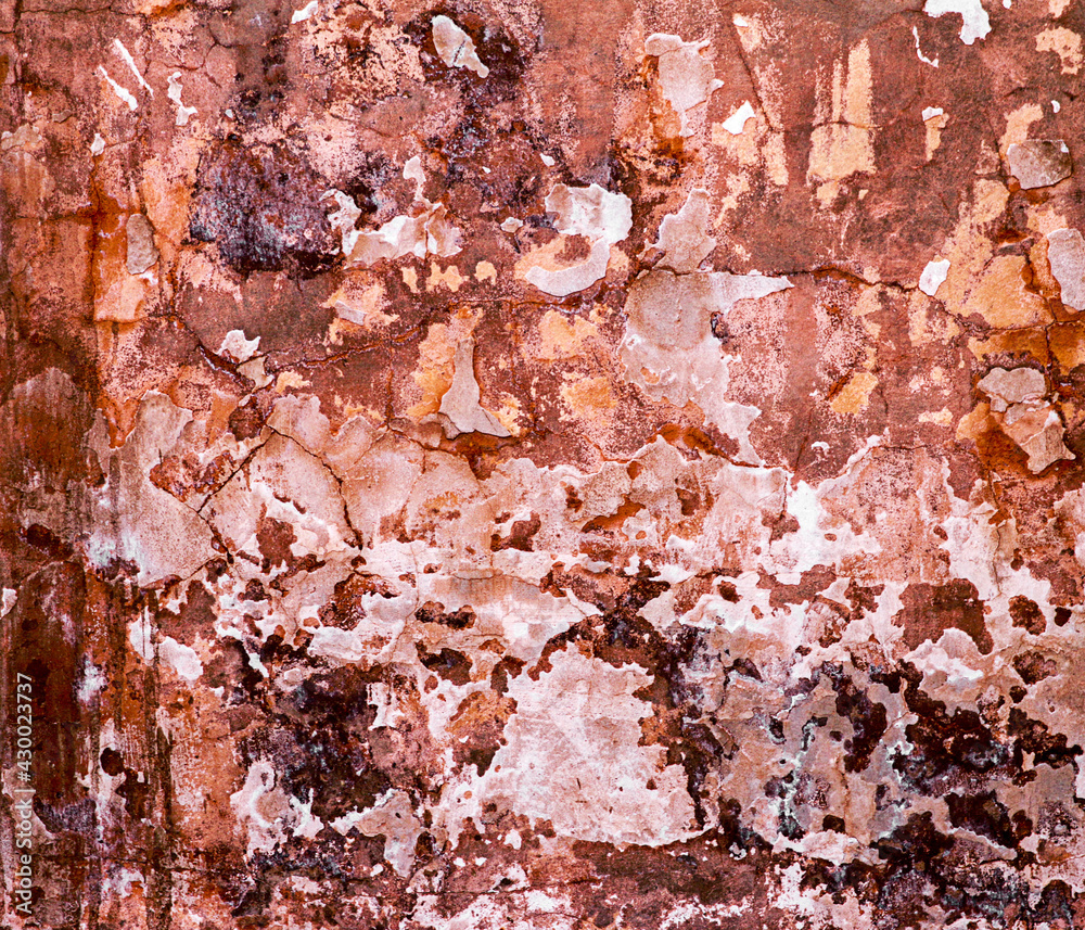 Aged brown cracked texture on the wall of the house.Colorful painted wall texture. Decorative wall luxury paint. Abstract grunge stucco art surface Aged brown cracked texture on the wall of the house.Colorful painted wall texture. Decorative wall luxury paint. Abstract grunge stucco art surface
