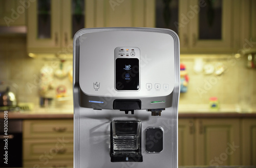 Coffee machine and water filter 2 in 1 in the house in the kitchen