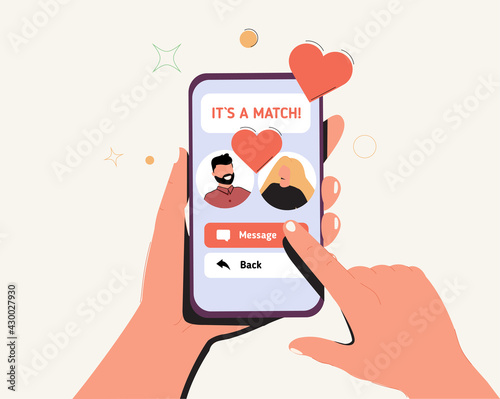 Female hand holding mobile phone with dating app interface. Couple match in online application on smartphone. Virtual photo