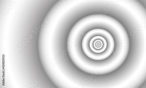 Monochrome background white-gray three-dimensional infinite circles. Spiral illusion