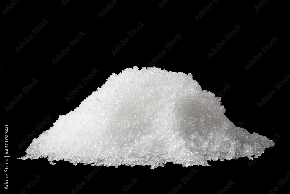 Heap of white snow isolated on black background
