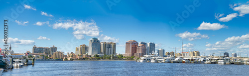 West Palm Beach panoramic view of city port with boats and skyline on a sunny winter day, Florida