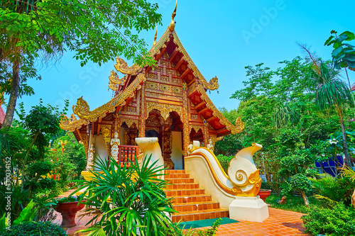 The ornate Viharn of Wat Phra Singh, Chiang Rai, Thailand photo