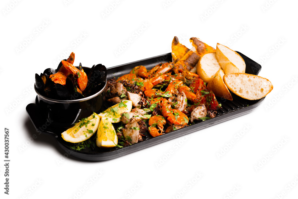 Isolated photo of a set from delicious prepared sea food. Isolated photo of a set from delicious prepared sea food.
