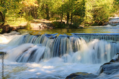 Fototapeta Naklejka Na Ścianę i Meble -  Water in slow motion at the Bond Waterfalls in the Upper Penisula of Michigan.
