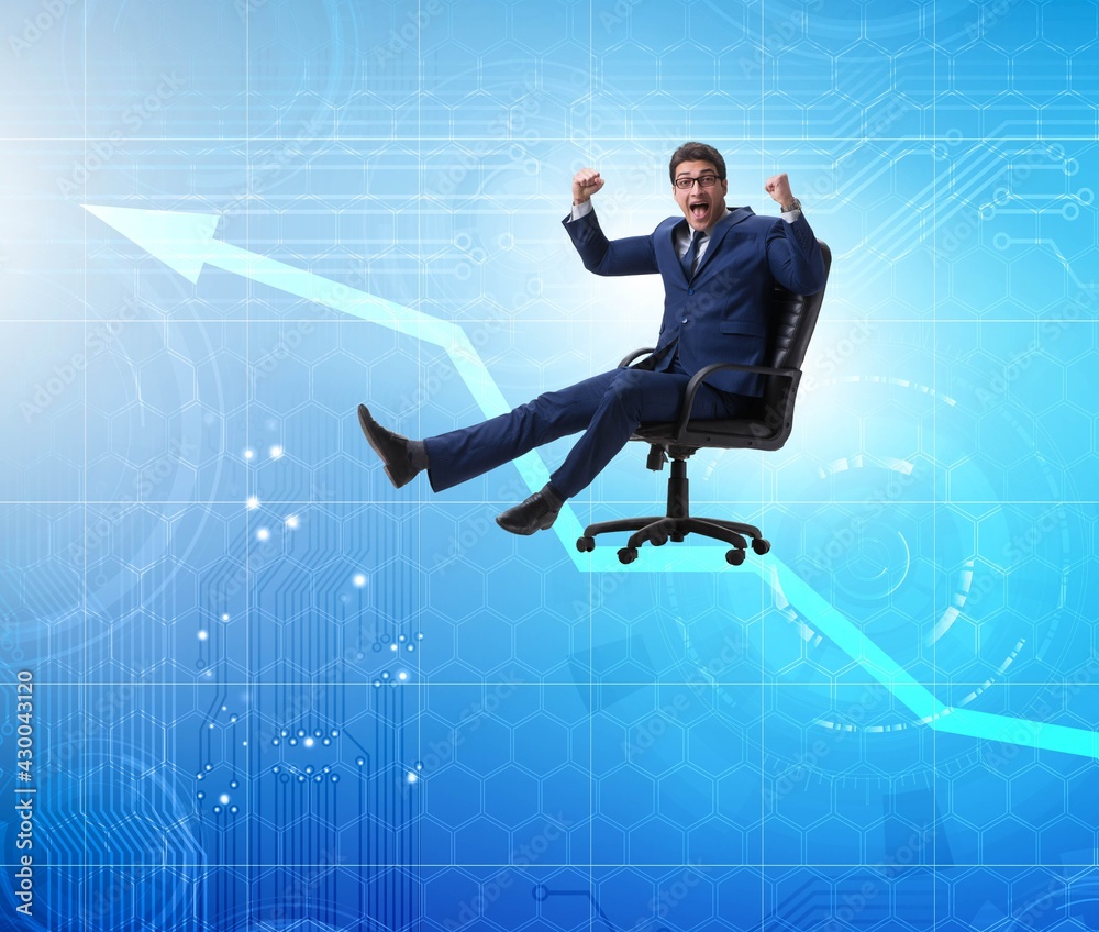Businessman in economic growth concept Businessman in economic growth concept