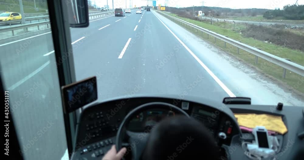 selective focus of a bus driver and his perspective in a bus traveling on Istanbul highway, Arnavutkoy, Istanbul, Turkey - 03.11.2021.