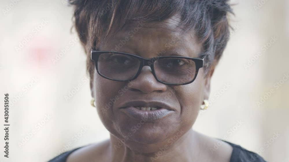 Portrait of older black female talking to camera Portrait of older black female talking to camera