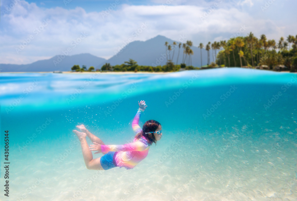 Child snorkeling. Kids underwater. Beach and sea.