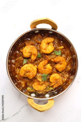 Indian food- Prawns masala or shrimp curry. Also known as Kolambi che Kalvan in Marathi. Chingri fry. Maharashtrian Prawns curry. Copy space.