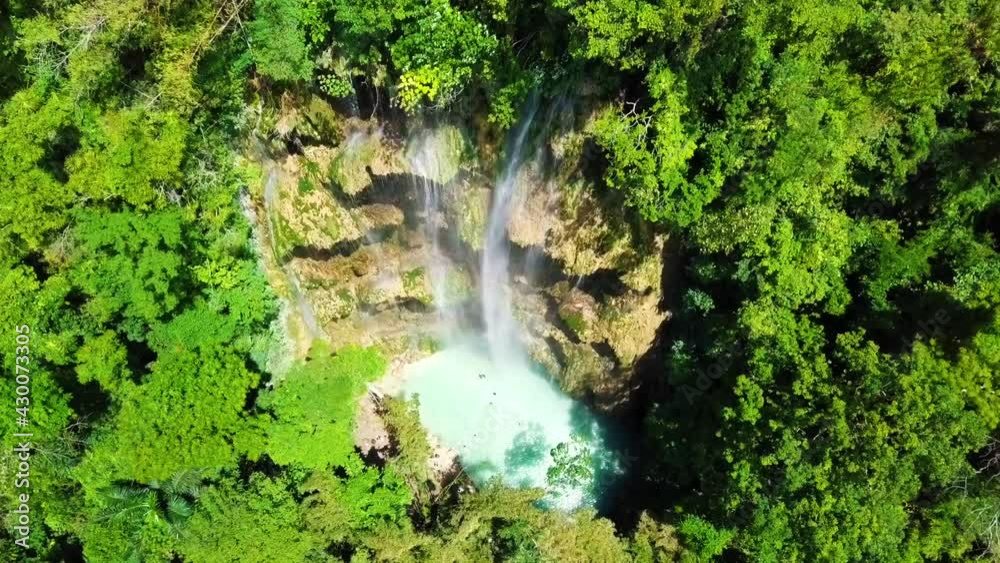 Aerial of jungle waterfall and turquoise pool, Philippines. Aerial of jungle waterfall and turquoise pool, Philippines.