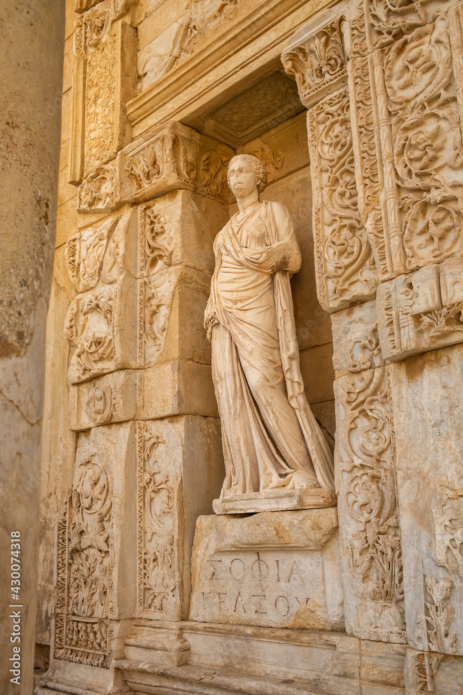 Antique statue at the facade of the Library of Celsus in the ancient city of Ephesus, Turkey