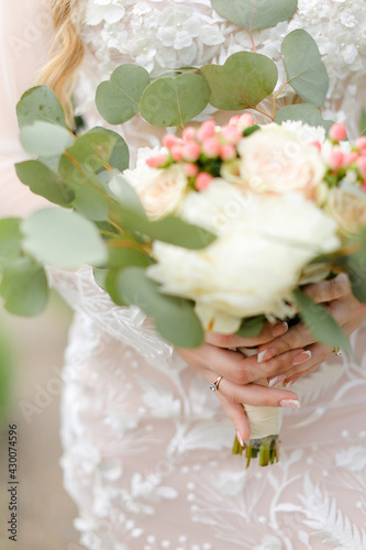 Closeup cute bride bouquet of roses. photo