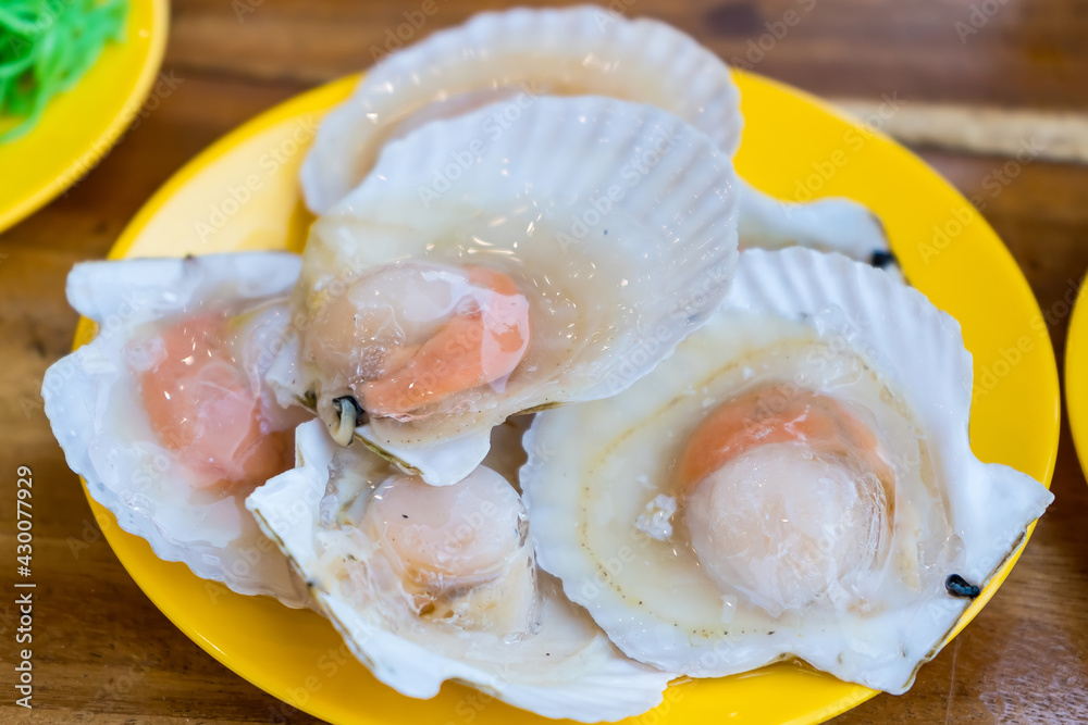 Fresh scallops in a grilled buffet restaurant in Thailand Fresh scallops in a grilled buffet restaurant in Thailand