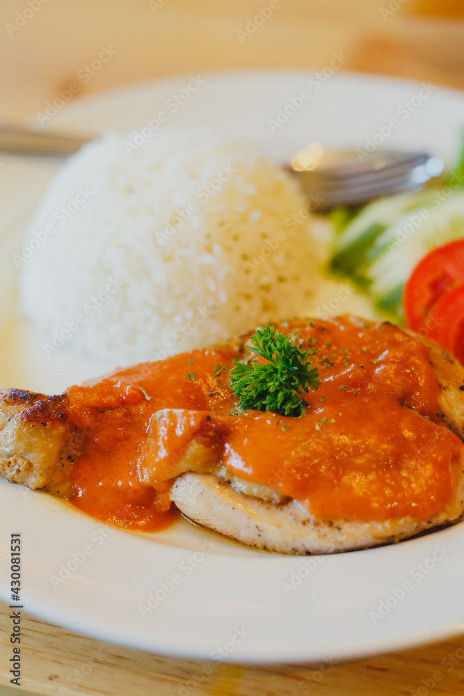 Rice with chicken steak on a plate restaurant cafe Rice with chicken steak on a plate restaurant cafe