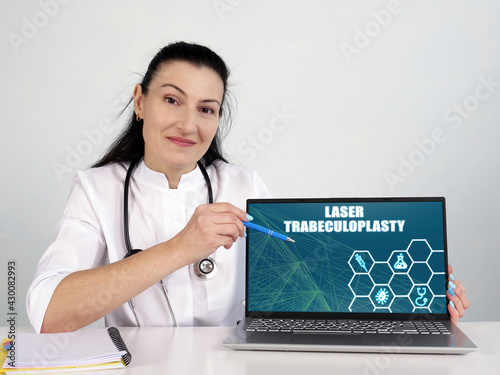  LASER TRABECULOPLASTY phrase on the screen. medico use internet technologies at office. photo