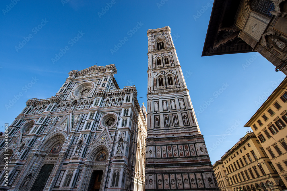Main facade of the Florence Cathedral, Duomo of Santa Maria del Fiore and bell tower of Giotto (Campanile). UNESCO world heritage site, Tuscany, Italy, Europe.