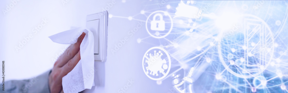House cleaning concept. Wipe dust off surfaces. Disinfectant treatment of door handles TV electrical. Sanitary treatment at home in quarantine. House cleaning concept. Wipe dust off surfaces. Disinfectant treatment of door handles TV electrical. Sanitary treatment at home in quarantine.