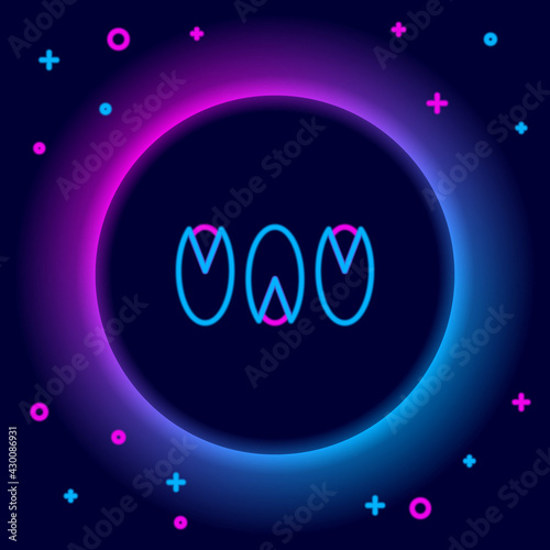 Glowing neon line Pistachio nuts icon isolated on black background. Colorful outline concept. Vector