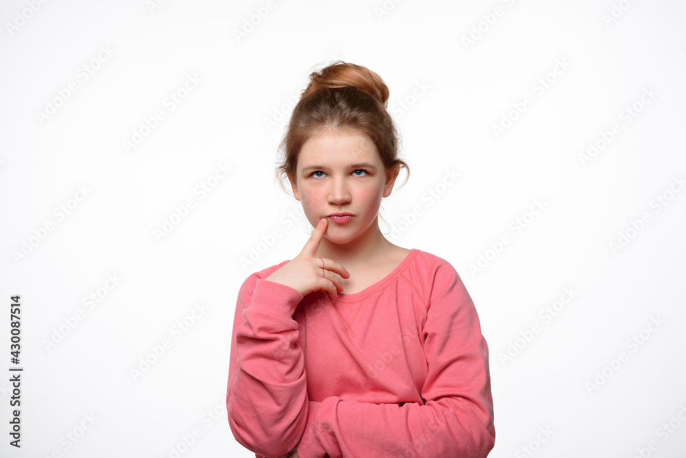 Portrait of thinking young girl touching herself face by index finger, making plan, pondering. Thinking positive Portrait of thinking young girl touching herself face by index finger, making plan, pondering. Thinking positive