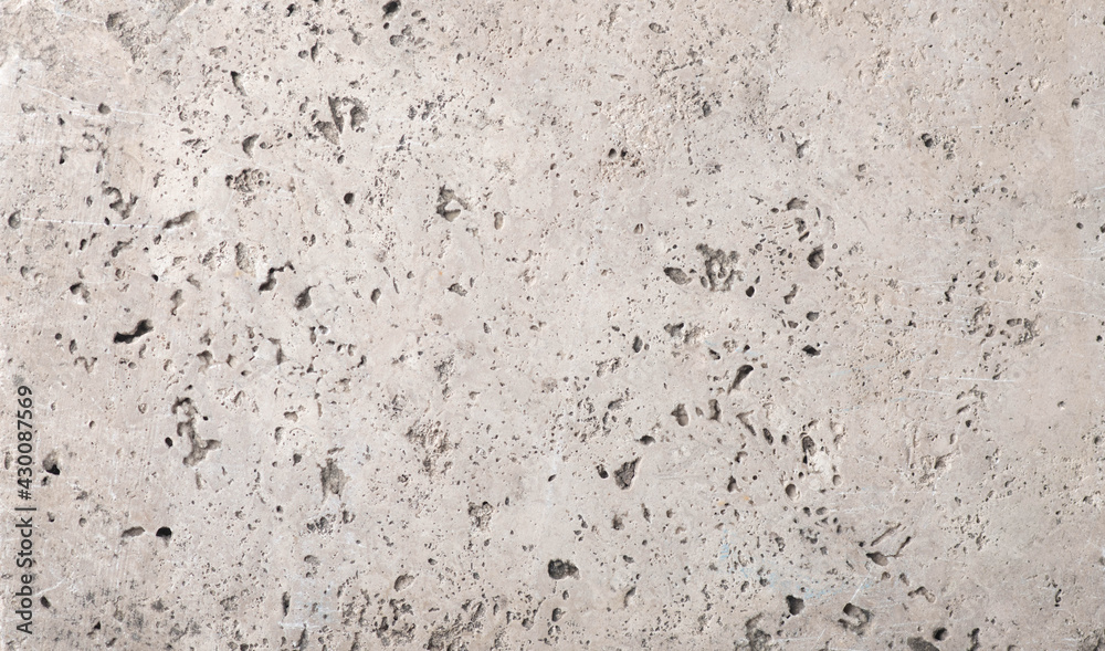beige concrete wall background with texture and scuffs beige concrete wall background with texture and scuffs