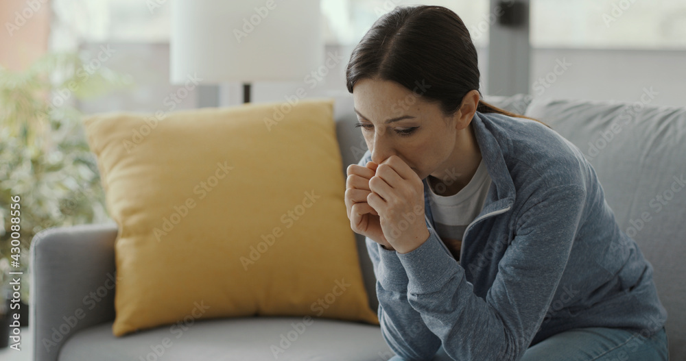 Sad depressed woman self-isolating at home Sad depressed woman self-isolating at home