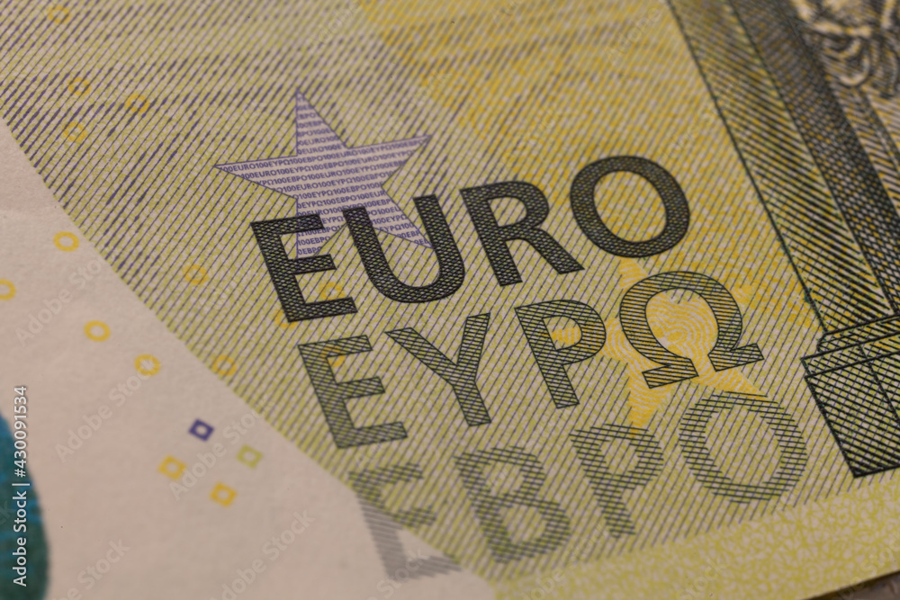 Obraz premium Series of macro shots of details of 100 euro bill. Europa series. Security features and design. EURO inscription