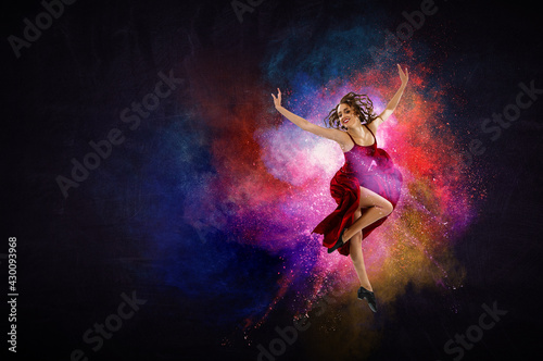 Fototapeta Naklejka Na Ścianę i Meble -  Female dancer against colourful background