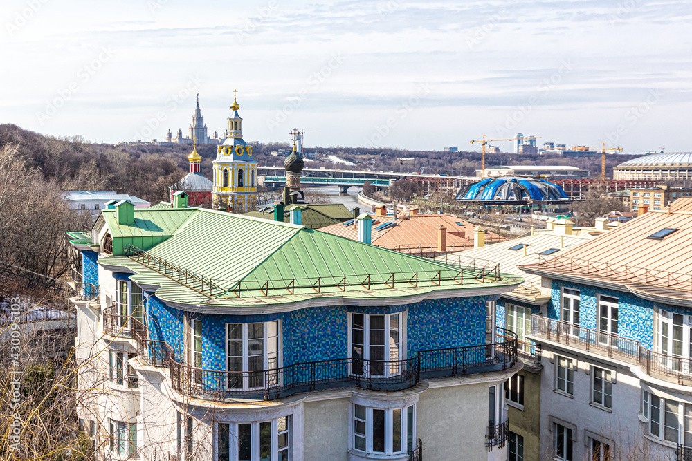 View of the Vorobyovy Gory, the domes of the monastery, MSU and the roofs of the houses