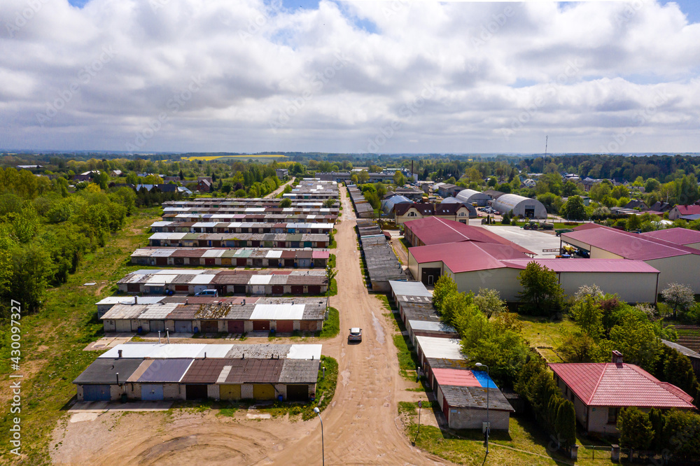 view from above of the Dobele city, car garages on the outskirts of the residential area, Latvia view from above of the Dobele city, car garages on the outskirts of the residential area, Latvia