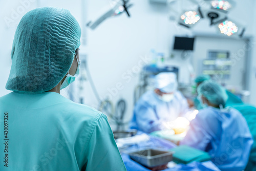 assistant or staff of Team surgeon at work in operating room. photo