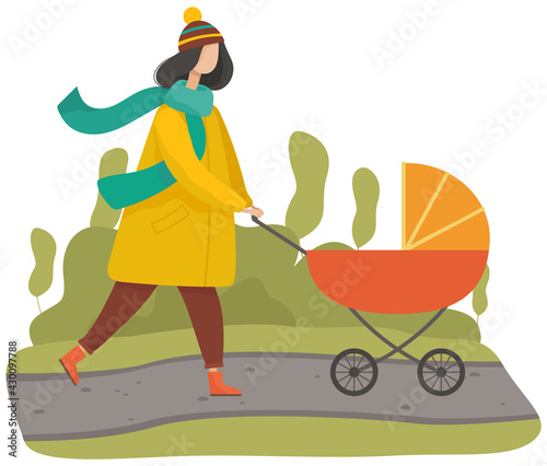 Woman strolling with baby in autumn park. Mother taking care about her child in orange carriage. Walking in forest, wood or lawn. Female character in warm clothes walks through park with stroller