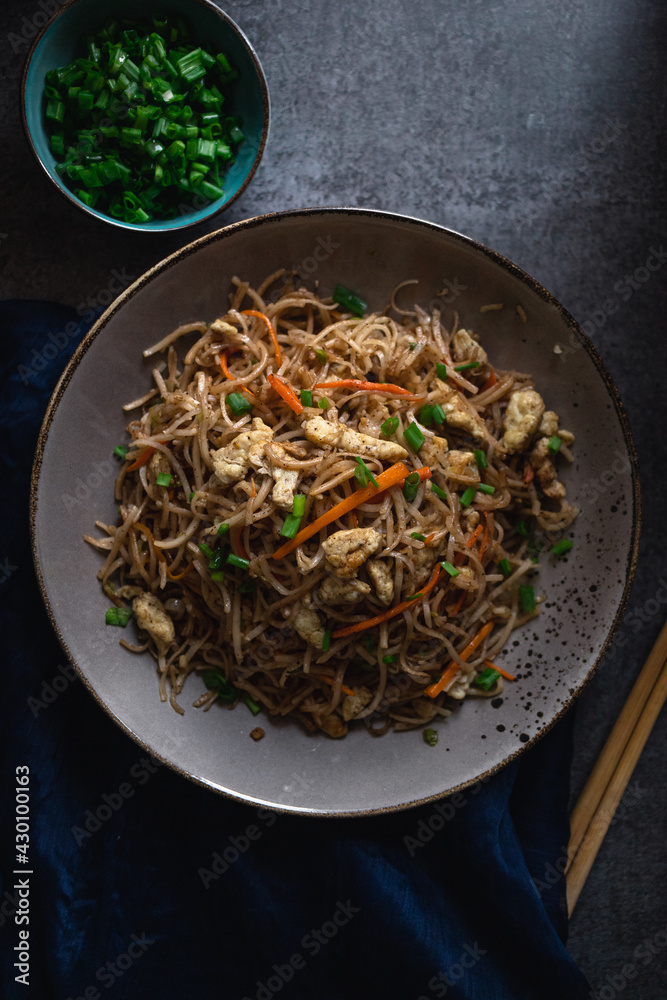 Chinese Egg Noodles flat lay - egg noodles with carrots and spring onions Chinese Egg Noodles flat lay - egg noodles with carrots and spring onions