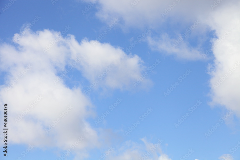 Beautiful blue sky with Cumulus clouds panorama on Sunny spring day, stratosphere view background texture Beautiful blue sky with Cumulus clouds panorama on Sunny spring day, stratosphere view background texture