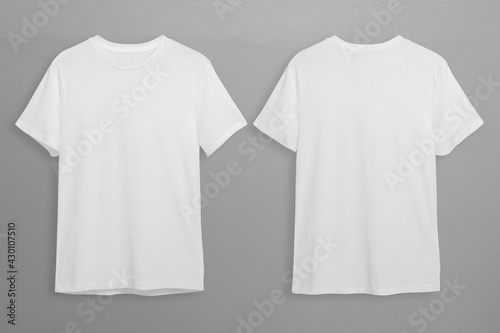 Photo White t-shirts with copy space on gray background