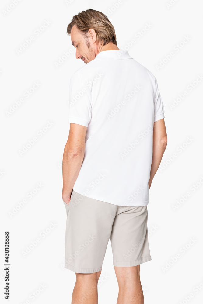 Mature man in basic white polo shirt with design space rear view Mature man in basic white polo shirt with design space rear view