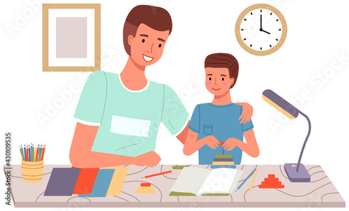 DIY activity for father and son. Dad and kid spend quality time together. Creative family pastime. Family makes paper crafts, glues and cuts with scissors. Parent with child spends time creatively
