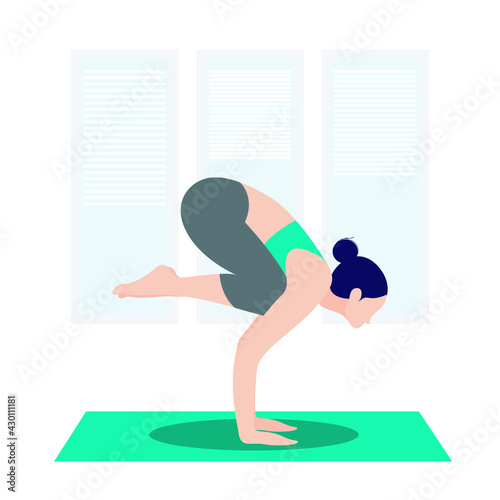 Active woman practicing yoga at home 