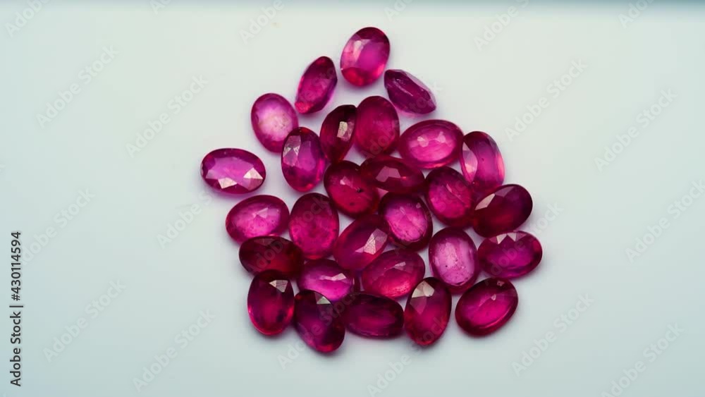 natural red rhodolite gemstone on the turning table natural red rhodolite gemstone on the turning table