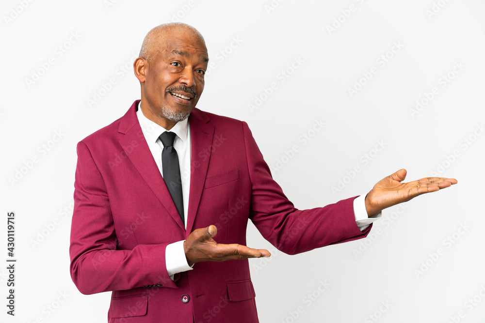 Cuban senior isolated on white background with surprise expression while looking side Cuban senior isolated on white background with surprise expression while looking side