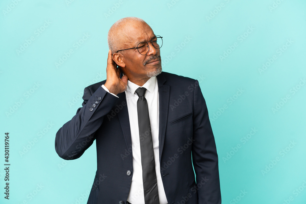 Business senior man isolated on blue background having doubts Business senior man isolated on blue background having doubts